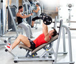Foto: group with weight training equipment on sport gym group with weight training equipment on sport gym