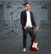 stylish man with guitar looking at camera