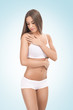 young woman touching her body young woman touching her body