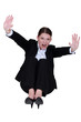 Businesswoman holding hands out