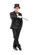 Magician holding a magic wand posing Magician holding a magic wand posing