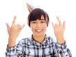 Photo: smiling boy with party hat smiling boy with party hat