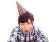 bored boy wearing party hat