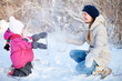 Mother and daughter outdoors at winter