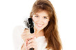girl pointing hairdryer