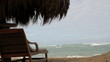 Chair blows in wind at beach Chair blows in wind at beach