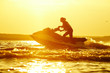 beautiful girl riding her jet skis