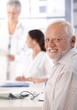 Mature man on health control smiling