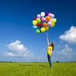 Girl with colorful balloons