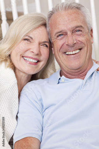 Photo: Happy Senior Man & Woman Couple Smiling at Home Happy Senior Man & Woman Couple Smiling at Home