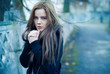 Beautiful girl freezing in the street