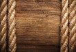Photo: rope on weathered wood background rope on weathered wood background