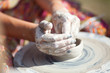 hand on a potter wheel at the fair