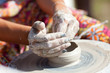 hand on a potter wheel at the fair
