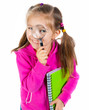 girl looking through a magnifying glass