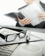 Businessman at office reading a contract Businessman at office reading a contract