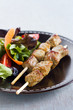 Beef skewer with salad