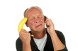 Desperate man phoning with banana gun against his head