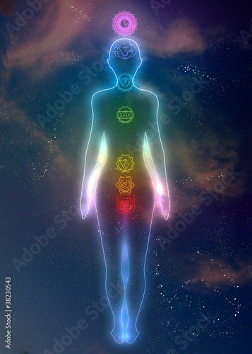 Illustration: System of human chakras on abstract space background System of human chakras on abstract space background