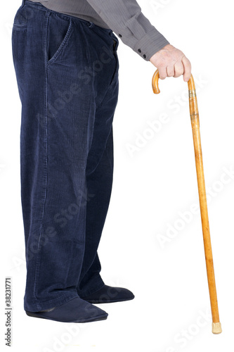 Photo: Body of senior man leaning on cane Body of senior man leaning on cane
