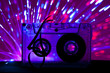 Transparent Cassette tape and disco light background