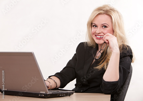 Photo: Pretty caucasian blond businesswoman Pretty caucasian blond businesswoman
