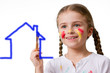 Cute girl painting house (space for text)