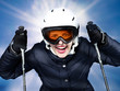 Young skiing woman enjoys winter sports outdoors