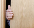 Hand and door.