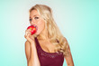Sexy Blonde Woman Biting Apple