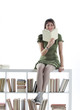 Foto: young Woman holding an open book . cover is blank young Woman holding an open book . cover is blank