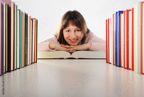 Foto: Female student with books, look at camera Female student with books, look at camera