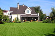 A new house with a garden in a rural area A new house with a garden in a rural area