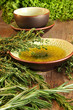 Photo: Fresh herbs on wooden cutting board Fresh herbs on wooden cutting board