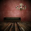 Wohndesign - Ledersofa vor roter Wand
