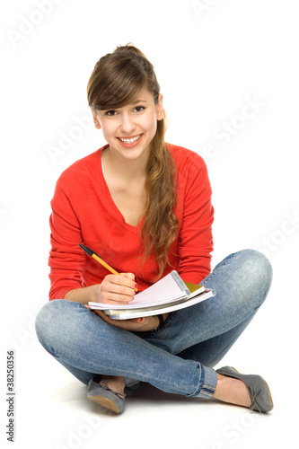 Photo: Female student sitting Female student sitting