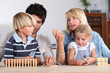Family playing dominoes