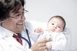Doctor holding a baby