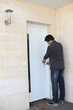 Man locking his door