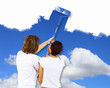 Young couple with paint brushes together