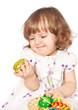 Beautiful girl holding Easter eggs
