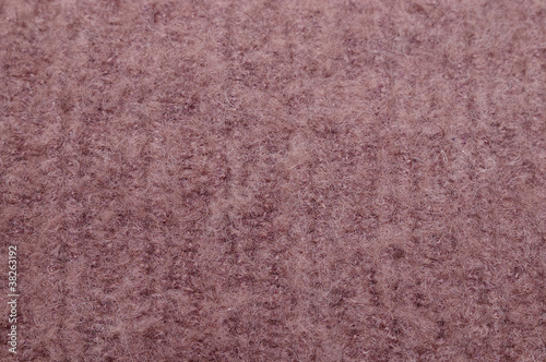 Photo: Closeup of light brown shag woolen texture Closeup of light brown shag woolen texture