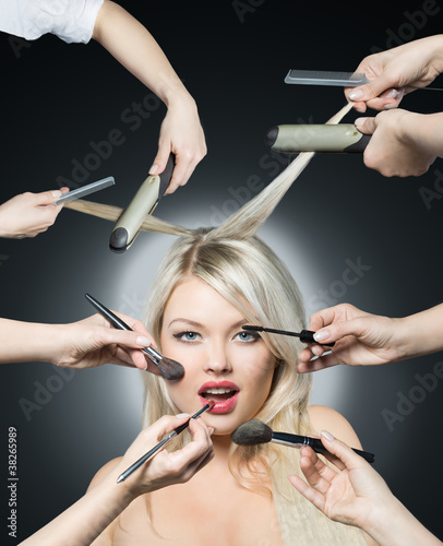 Photo: Portrait beautiful white hair girl with makeup brushes near attr Portrait beautiful white hair girl with makeup brushes near attr