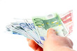 Euroscheine in einer Hand