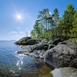 Foto: Sun and stony shore of Ladoga lake, Karelia, Russia Sun and stony shore of Ladoga lake, Karelia, Russia