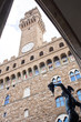 Bronze statue of Perseus and Palazzo Vecchio in Florence Bronze statue of Perseus and Palazzo Vecchio in Florence