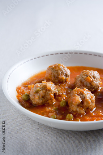 Photo: Stewed meatballs with peas, tomato and onion. Stewed meatballs with peas, tomato and onion.