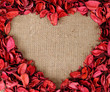 Photo: Heart shaped frame made from red petals Heart shaped frame made from red petals