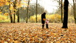Video: Mother and her daughter is walking in the autumn park Mother and her daughter is walking in the autumn park