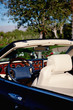 Close-up view steering wheel of open roof car